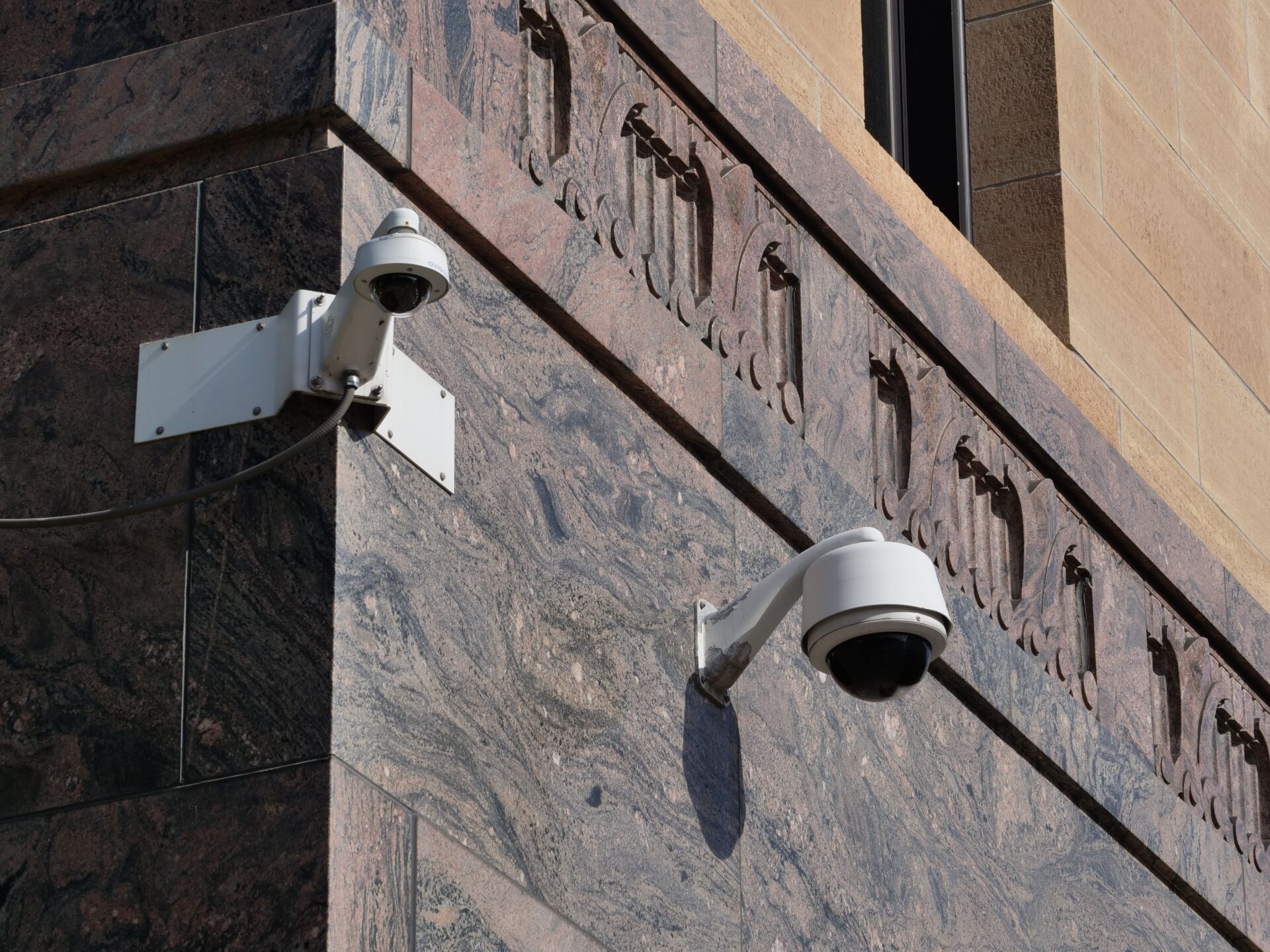 Professionally installed CCTV camera covering a commercial business entrance